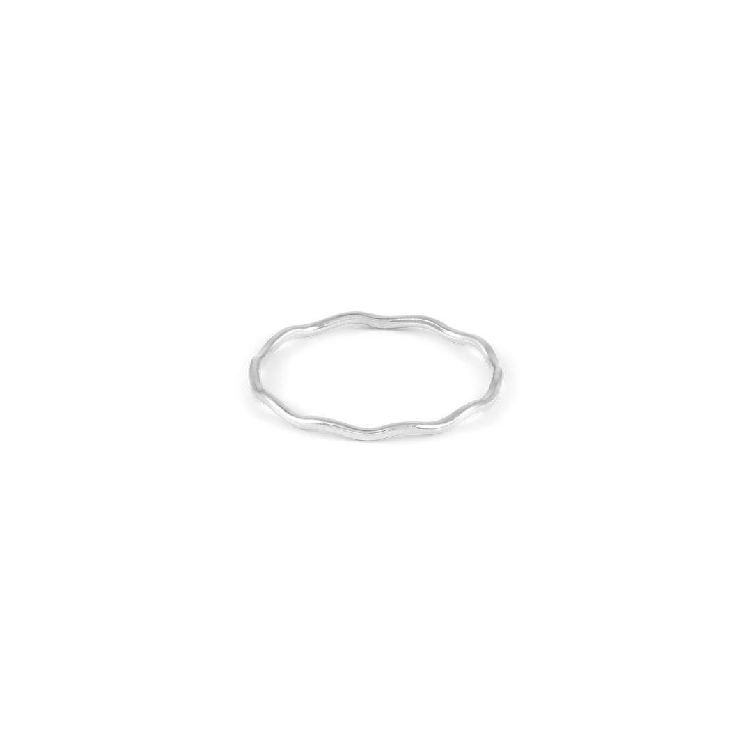 A silver ring with an organic, asymmetrical shape, appearing elegant and minimalist.