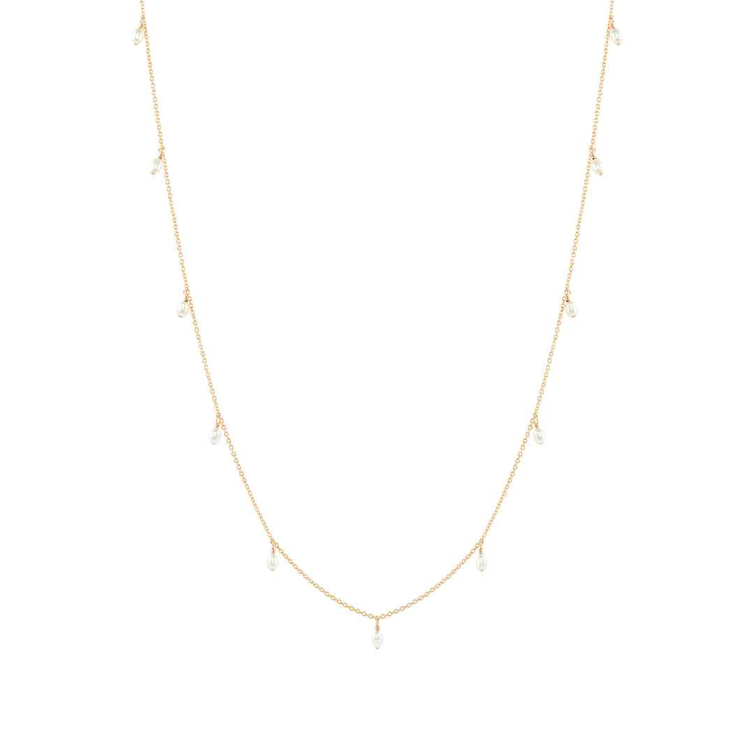A gold-filled necklace with a plain chain and dangling freshwater pearls, presented against a white background.
