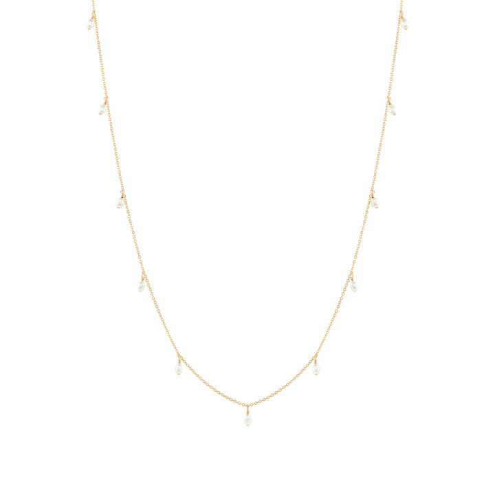 A gold-filled necklace with a plain chain and dangling freshwater pearls, presented against a white background.