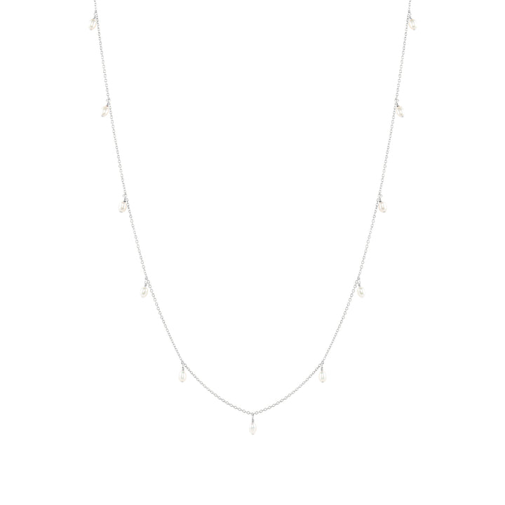A sterling silver necklace with a fine plain chain and dangling freshwater pearls, presented against a white background.