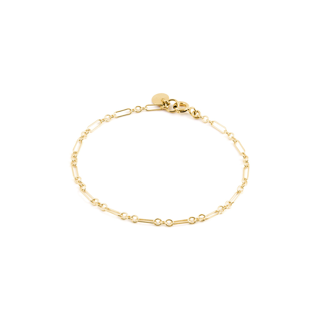 A gold-filled link chain bracelet with a clasp closure. Made in gold-filled